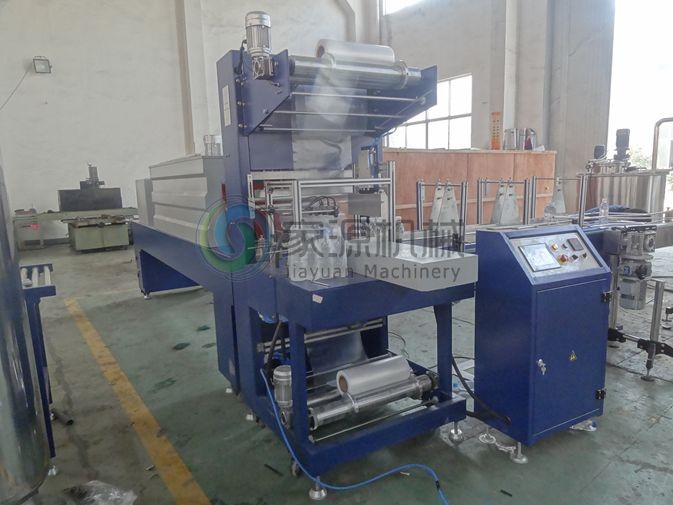 PLC Control Shrink Packing Machine 15000BPH For Mineral Water 2