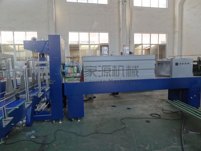PLC Control Shrink Packing Machine 15000BPH For Mineral Water 0