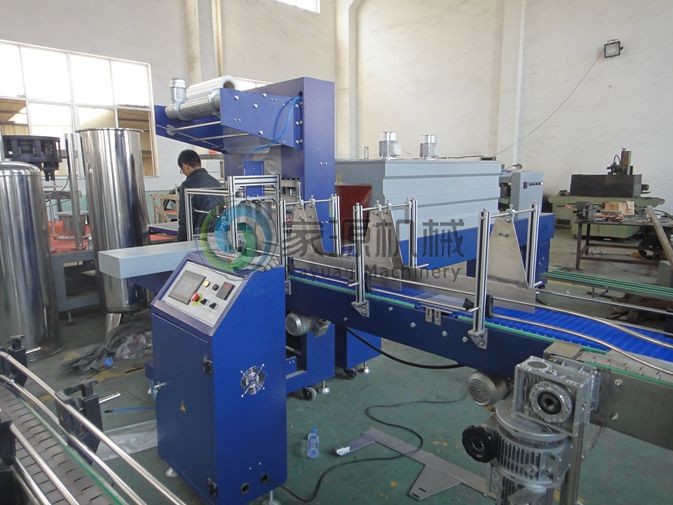 PLC Control Shrink Packing Machine 15000BPH For Mineral Water 1