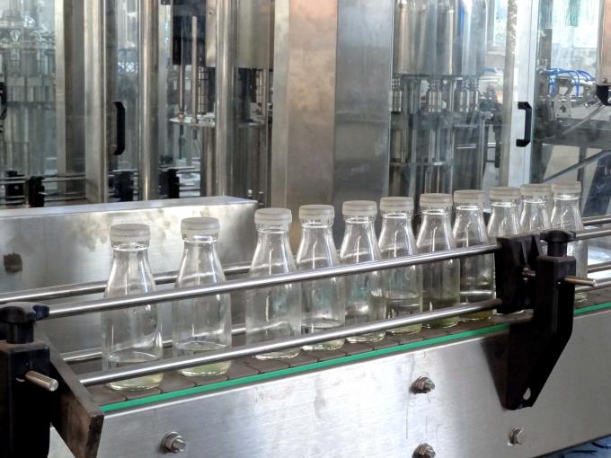 Professional 6000BPH Glass Bottle Filling Machine , One Year Warranty 1