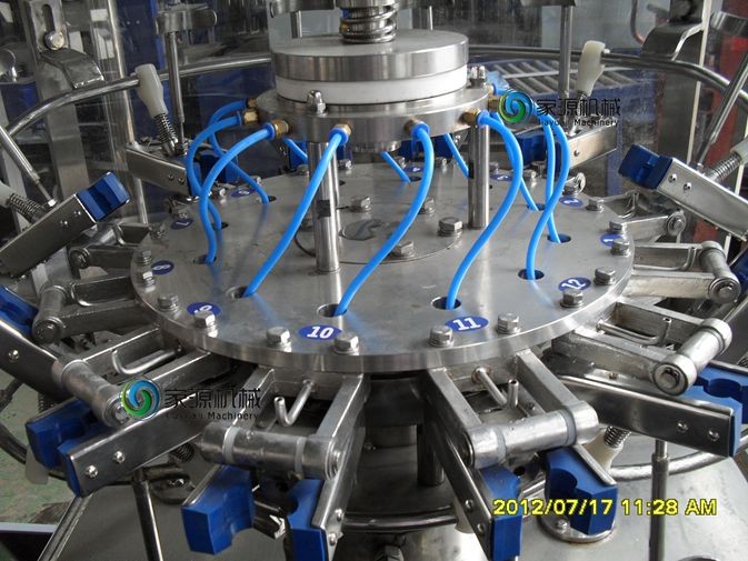 Glass Bottle Beverage Filling Machine 250ml - 1250ml Rotary Filling Machine